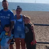 Ben Longley and his family safely on the beach at Ingoldmells after rescuing two children drifting out to sea in a dinghy. He describes his terrifying battle against the current to warn parents of the dangers of the sea and urge them to keep their children close. See this week's Skegness Standard for full story.