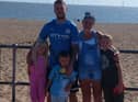 Ben Longley and his family safely on the beach at Ingoldmells after rescuing two children drifting out to sea in a dinghy. He describes his terrifying battle against the current to warn parents of the dangers of the sea and urge them to keep their children close. See this week's Skegness Standard for full story.