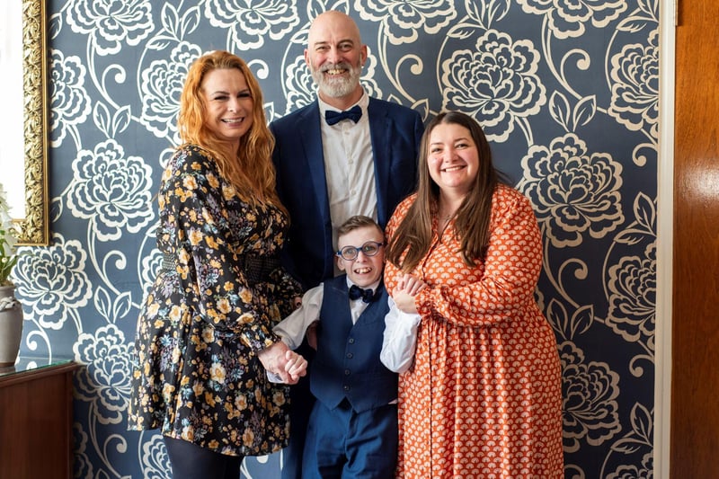 Award winner Tom pictured with his mum, left, dad, and teacher, right.