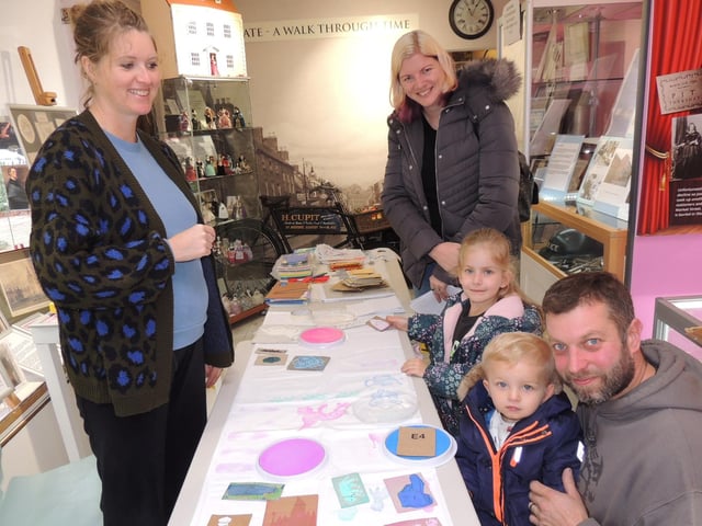 Flag Stories activities at Sleaford Museum with artist in residence Charlotte Tupper (left) with youngsters Richard and Rebecca Dann and parents Kerry and Steve Dann.