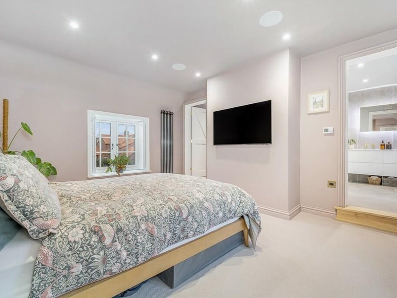 One of the bedrooms and ...