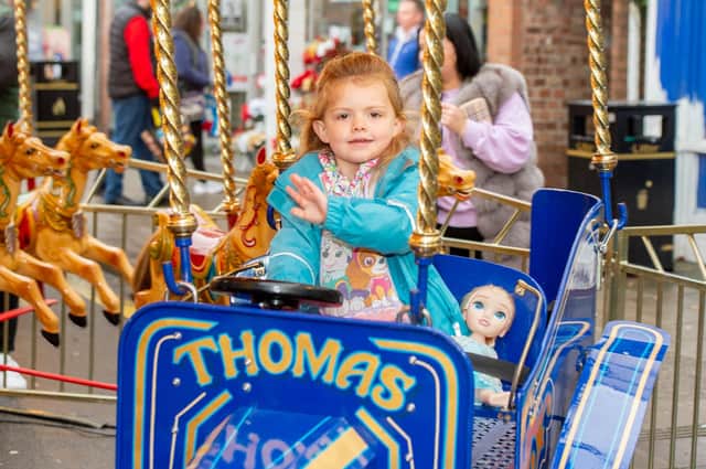 Olivia Cartwright, 4, on the fairground.