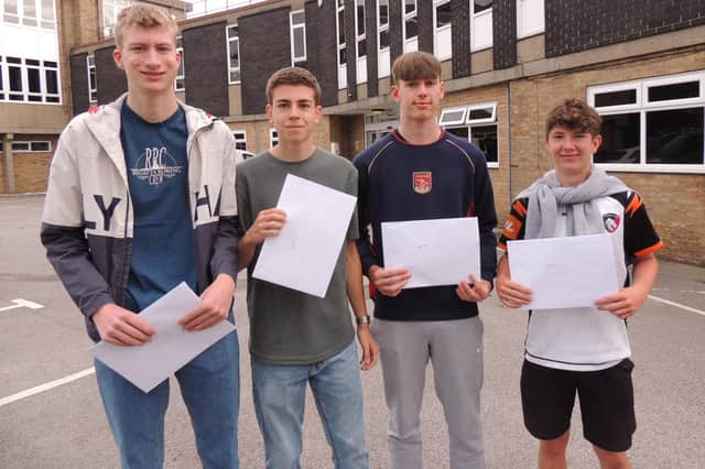 Getting their grades. GCSE results day at Carre's. From left - Charlie Getton, Sam Button, Sam Smith and Ben Issott.