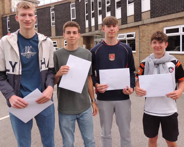 Getting their grades. GCSE results day at Carre's. From left - Charlie Getton, Sam Button, Sam Smith and Ben Issott.
