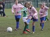 Kids can mix in school but not on the football pitches away from school.