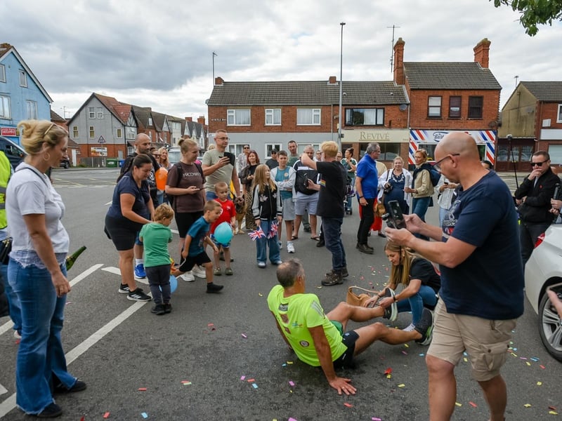A crowd gathered to welcome him at the finish.