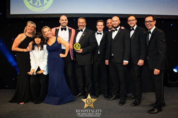 The team from the Coaching Inn Group with Strictly Come Dancing star and awards host Claudia Winkleman.