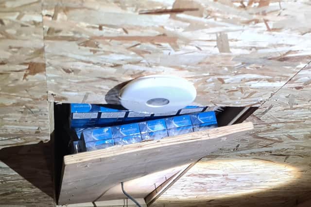 Specialist detection dogs helped find a hide in a ceiling at the shop in Boston.
