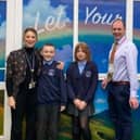 Matt Warman, MP for Boston and Skegness, and headteacher Fiona Booth, with St Nicholas pupils.