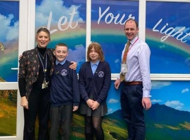 Matt Warman, MP for Boston and Skegness, and headteacher Fiona Booth, with St Nicholas pupils.