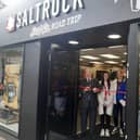 Mayor of Skegness Coun Pete Barry cuts the ribbon at the grand opening of Saltrock in Skegness.