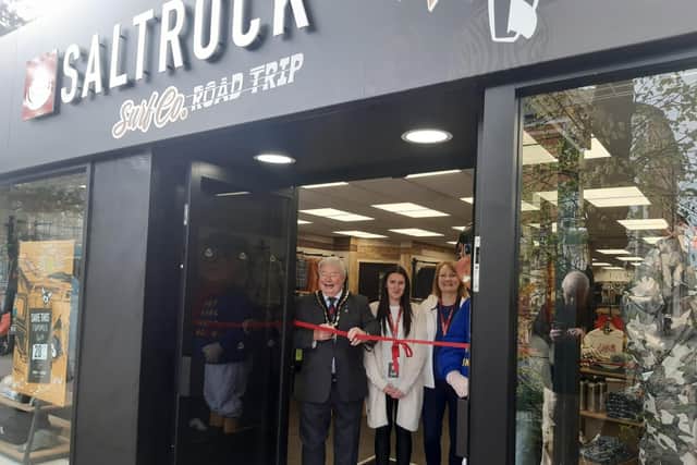 Mayor of Skegness Coun Pete Barry cuts the ribbon at the grand opening of Saltrock in Skegness.