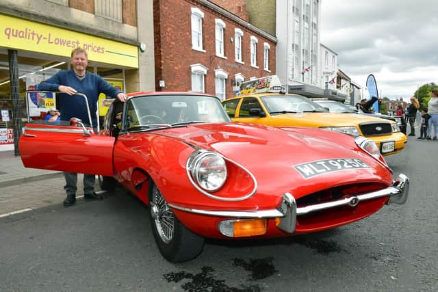 David Dawson, of Boston, with his 1968 Jaguar E-Type.