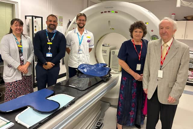 Julia and David Harrison with staff from United Lincolnshire Teaching Hospitals Oncology Department and United Lincolnshire Hospitals Charity.