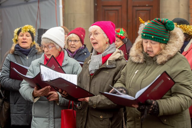 Horncastle Community Choir performing at the Christmas market.