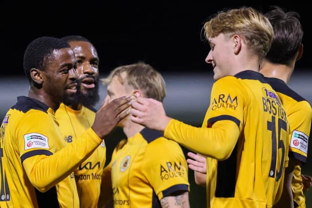 Boston celebrate one of their five goals last night, but still lost an incredible game. Photo by Chris Bray.
