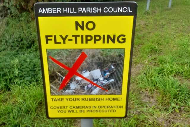 One of the warning signs that have been erected around Amber Hill, near Boston.