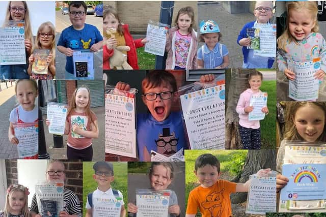 Children with the books they have found