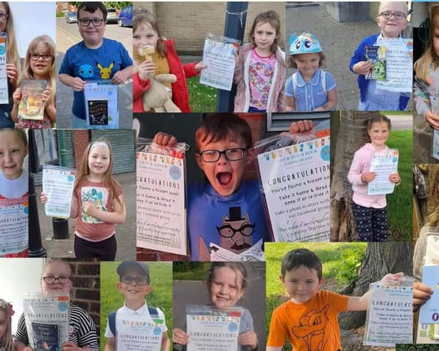 Children with the books they have found