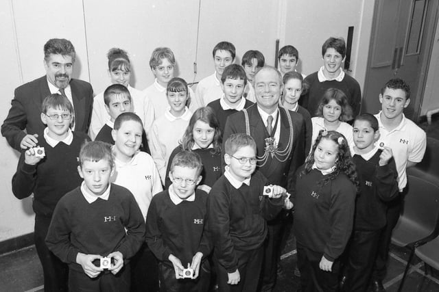 Haven High pupils receiving their commemorative Millennium Medals from the Mayor of Boston Coun Paul Goodale. Pictured with Coun Goodale are some of the school's pupils and Coun Shaun Forster.
