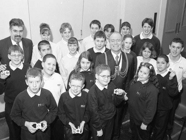 Haven High pupils receiving their commemorative Millennium Medals from the Mayor of Boston Coun Paul Goodale. Pictured with Coun Goodale are some of the school's pupils and Coun Shaun Forster.