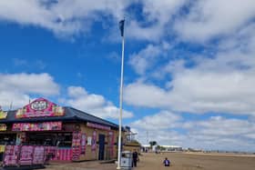 The Blue Flag flying on Skegness beach.