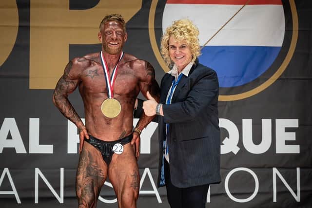 Tim McGibbon is named Classic Physique and Overall Classic winner at the Battle of Den Helder.