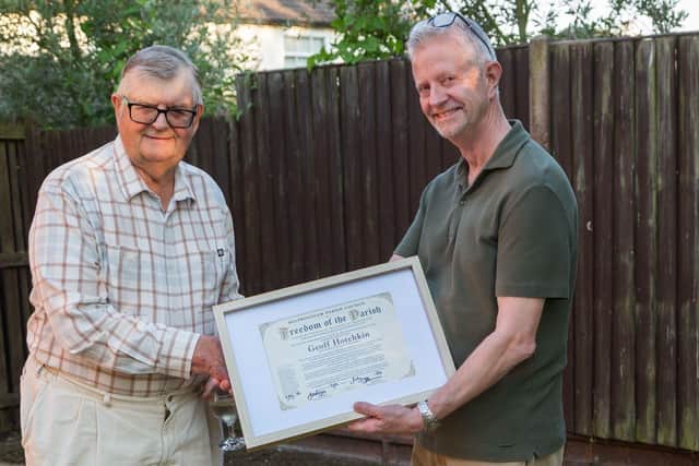 Coun Geoff Hotchkin (left) receives his honour from County Councillor David East. Photo: George Frizzell Photography