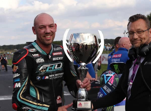 Hickman with Race Director Stuart Higgs with his trophy for second place. Pic by Dave Yeomans.