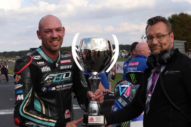 Hickman with Race Director Stuart Higgs with his trophy for second place. Pic by Dave Yeomans.