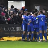 Trinity celebrate Dec Howe's winner against York.