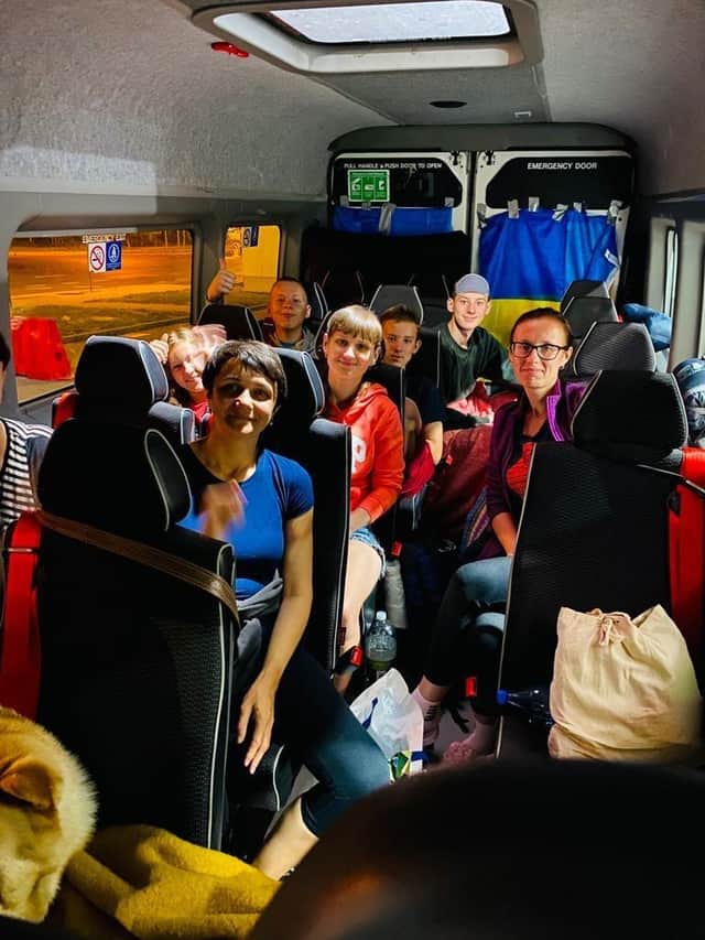 The Ukrainian refugees on the bus on the way back to the UK.