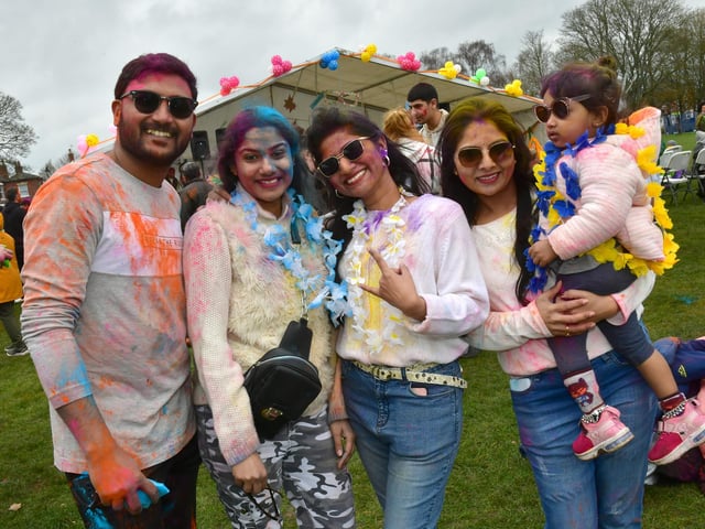 Enjoying the Holi event are Jaison Gladson, Jackline Prathibha, Edith Jovita Bangera, Soumya Acharya, and Relania Jihal, aged two.