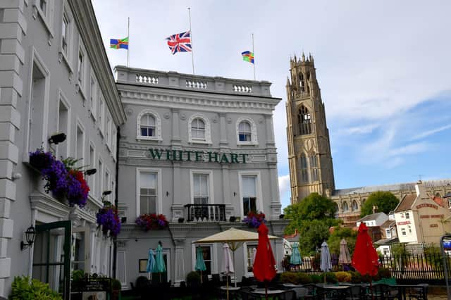 Flags flying at half mast at the White Hart Hotel, in Boston.