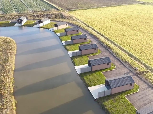 An aerial shot of the lakeside lodges