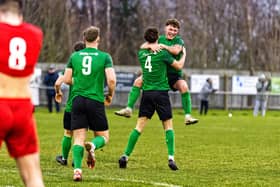 Sleaford celebrate after Ben Robson (no.4) scored against Heanor. Photo: Steve W Davies Photography.