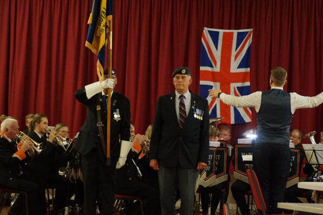 The Royal British Legion Standard was paraded into the room