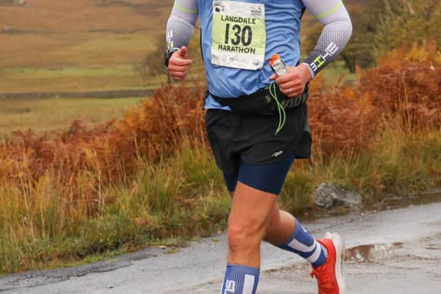 Lee Robinson taking part in a long distance running event in training for the Brathay 10 in 10 for the Brathay Trust.