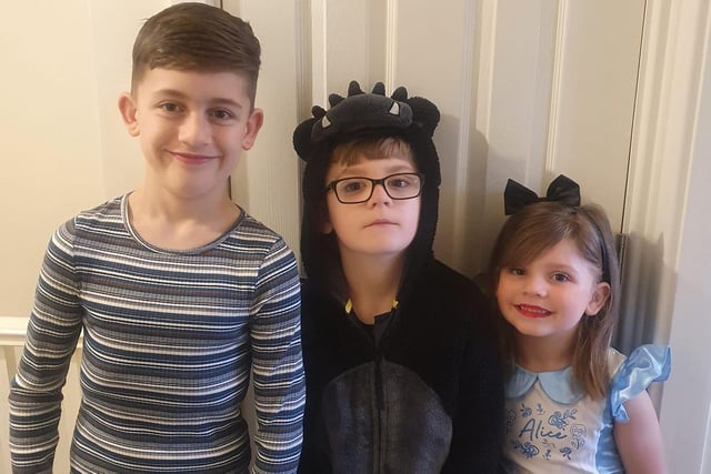 Siblings dressed as different book characters ready for World Book Day.