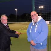 Mayor of Sleaford Coun Anthony Brand cuts the ribbon on the new floodlight system for Sleaford tennis Club, with club chairman Dr Stuart Clegg.
