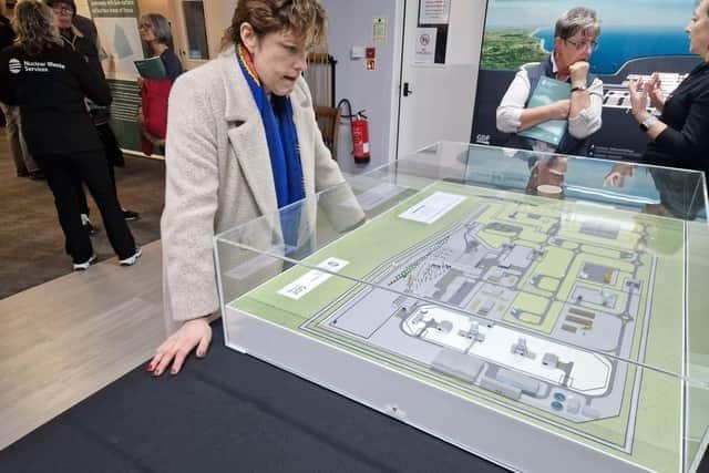 MP Victoria Atkins studying a model of the possible nuclear waste dump on agricultural land between the villages of Gayton le Marsh and Great Carlton.