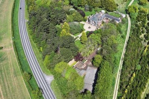 An aerial view of the home and its surroundings.