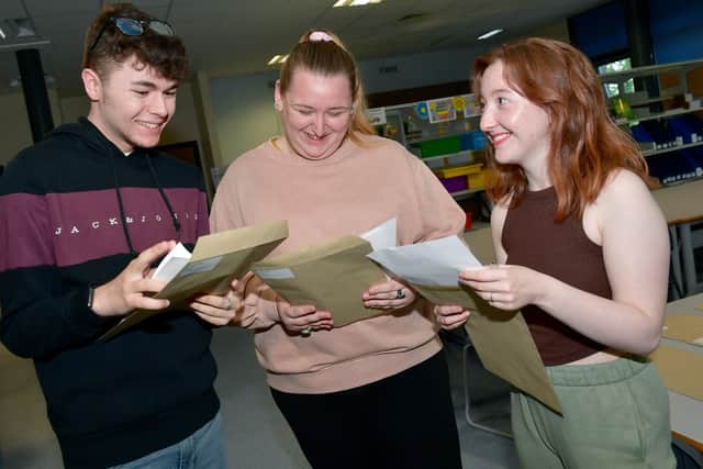 Results day at St George's Academy, Sleaford, from left - James Colley, 18, Lana Midgley, 18, and Brooke Zealand, 18.