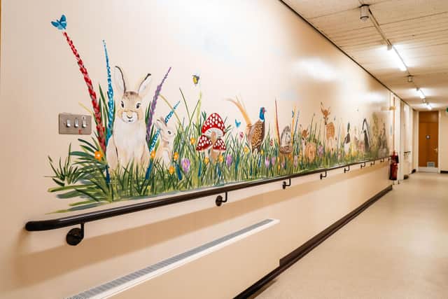 One of the vibrant murals by Michelle Codling – The Painting Lady.