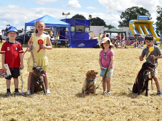 The cutest couple (dog and child) winners - 1st Colson, 6, and Skyla, 10, with Myla; 2nd Lucy, 4, with Poppy; 3rd Caius Mann-Tseng, 8, with Duffy. Photo: Holly Parkinson