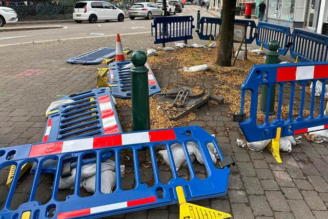 The unsightly barriers near the monument. Photo: LDR