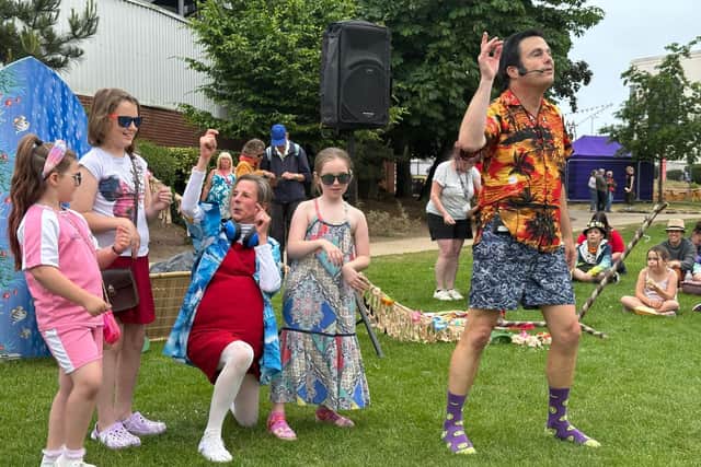 Young members of the audience enjoyed playing the air guitar to accompany Elvis.
