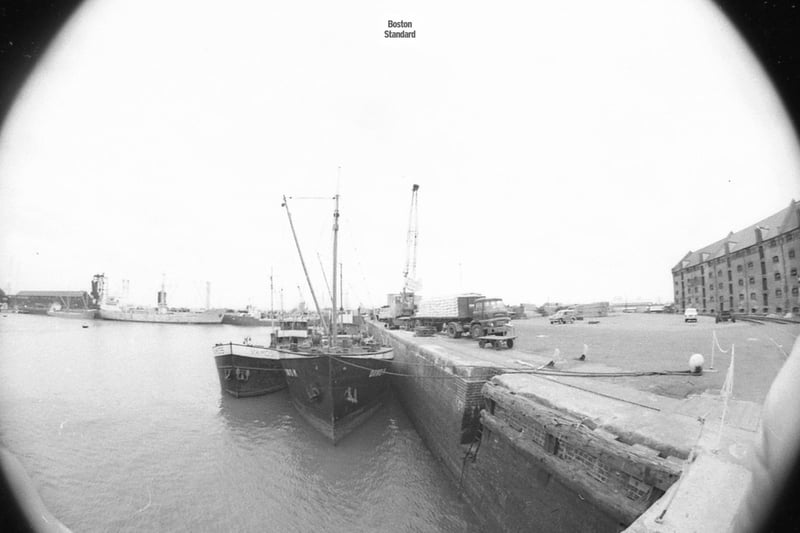 A couple of vessels and a lorry loaded with items at Boston Docks.