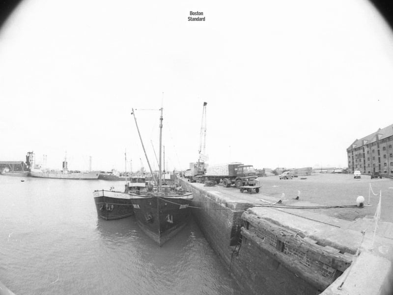 A couple of vessels and a lorry loaded with items at Boston Docks.