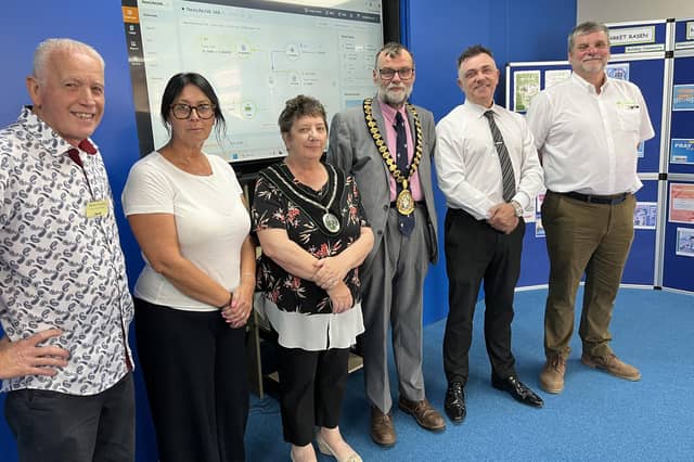 From left - Martin Forsythe (Market Rasen New Life Centre Manager); Coun Eve Bennett (West Lindsey District Council); Coun Jo Pilley (Market Rasen Mayor); Coun Stephen Bunney (West Lindsey District Council); David Harley (UK Specification Manager Bushboard Washrooms Systems); Steve Monnery (Artimus Renewables).